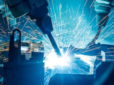 44962207 - welding robots movement in a car factory