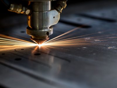 45244314 - cutting of metal. sparks fly from laser, close-up